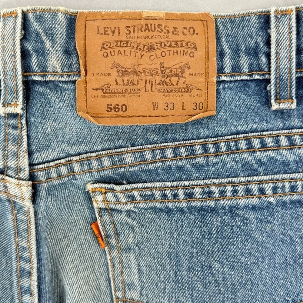 VTG Levis 560 Loose Fit Tapered Leg Orange Tab Jeans Blue Mens 33x30 USA Made